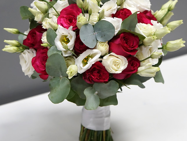 Bridal bouquet with red roses, eustoma and eucalyptus photo